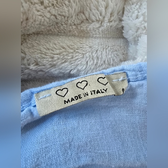 Light Blue Ruffle Hem Top With Button Detail Down The Black - Picture 2 of 10